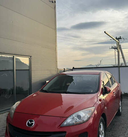 Красный Мазда 3, объемом двигателя 1.56 л и пробегом 275 тыс. км за 7000 $, фото 1 на Automoto.ua