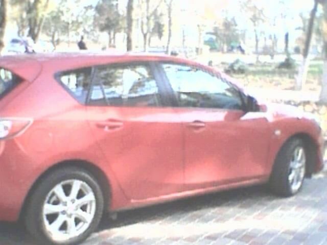Червоний Мазда 3, об'ємом двигуна 1.6 л та пробігом 95 тис. км за 11000 $, фото 1 на Automoto.ua