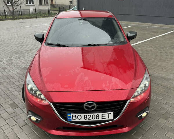 Красный Мазда 3, объемом двигателя 2.19 л и пробегом 208 тыс. км за 11850 $, фото 1 на Automoto.ua