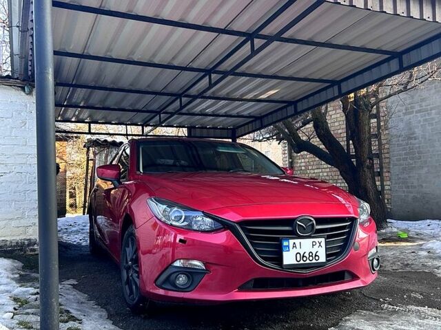 Красный Мазда 3, объемом двигателя 2 л и пробегом 170 тыс. км за 11000 $, фото 1 на Automoto.ua