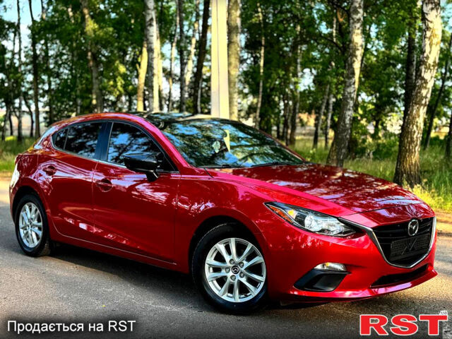 Красный Мазда 3, объемом двигателя 2 л и пробегом 143 тыс. км за 9350 $, фото 1 на Automoto.ua