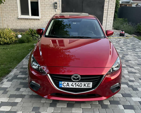 Красный Мазда 3, объемом двигателя 2 л и пробегом 122 тыс. км за 11700 $, фото 1 на Automoto.ua