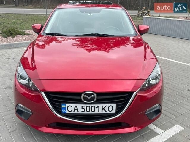 Красный Мазда 3, объемом двигателя 2 л и пробегом 128 тыс. км за 11300 $, фото 1 на Automoto.ua
