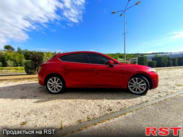 Красный Мазда 3, объемом двигателя 2 л и пробегом 56 тыс. км за 14500 $, фото 1 на Automoto.ua