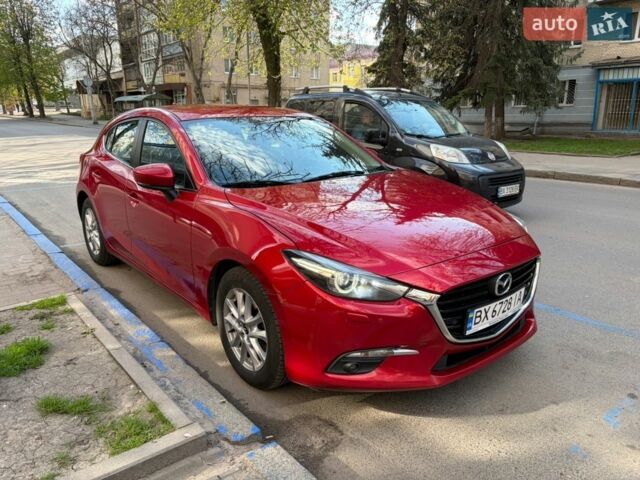 Красный Мазда 3, объемом двигателя 2 л и пробегом 114 тыс. км за 14500 $, фото 1 на Automoto.ua