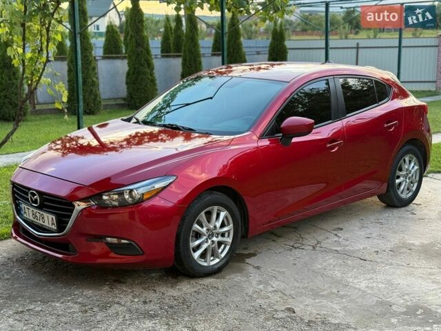Красный Мазда 3, объемом двигателя 2 л и пробегом 161 тыс. км за 10600 $, фото 1 на Automoto.ua