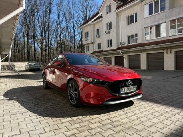 Красный Мазда 3, объемом двигателя 2.49 л и пробегом 114 тыс. км за 16000 $, фото 1 на Automoto.ua