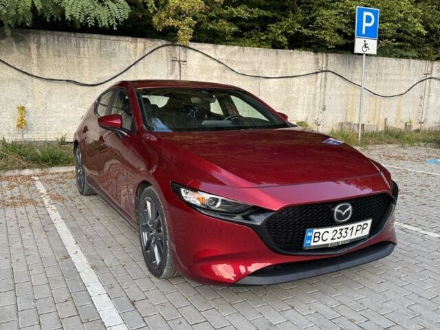 Красный Мазда 3, объемом двигателя 2.5 л и пробегом 74 тыс. км за 17500 $, фото 1 на Automoto.ua