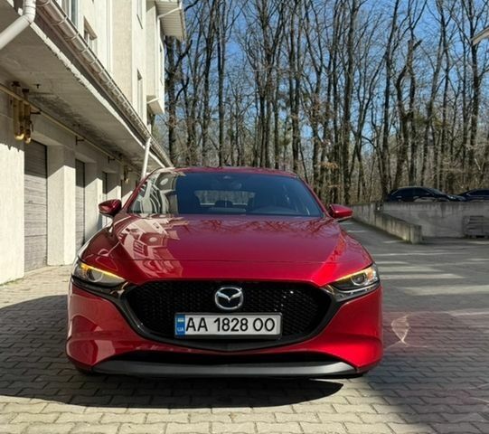 Красный Мазда 3, объемом двигателя 2.49 л и пробегом 114 тыс. км за 17777 $, фото 1 на Automoto.ua
