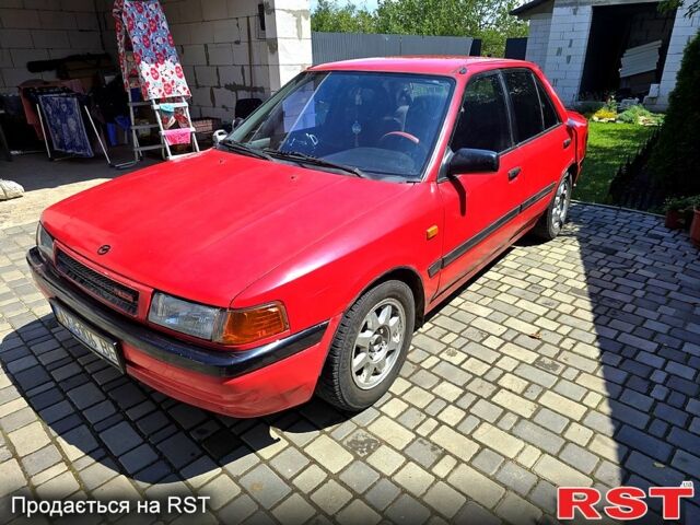 Красный Мазда 3, объемом двигателя 1.6 л и пробегом 240 тыс. км за 1450 $, фото 1 на Automoto.ua