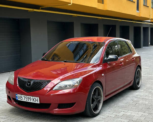Красный Мазда 3, объемом двигателя 2 л и пробегом 250 тыс. км за 3650 $, фото 1 на Automoto.ua
