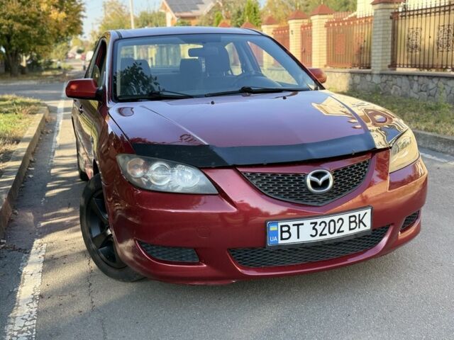 Червоний Мазда 3, об'ємом двигуна 2 л та пробігом 280 тис. км за 4270 $, фото 1 на Automoto.ua