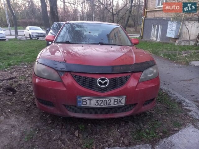 Красный Мазда 3, объемом двигателя 2 л и пробегом 245 тыс. км за 2900 $, фото 1 на Automoto.ua
