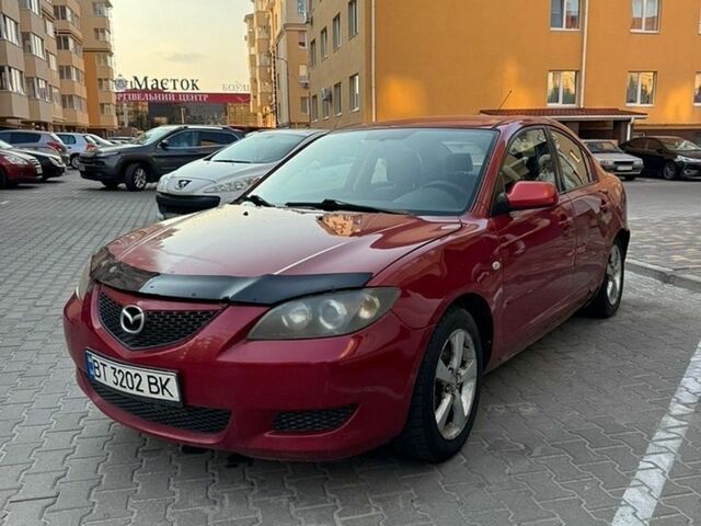 Червоний Мазда 3, об'ємом двигуна 2 л та пробігом 245 тис. км за 2600 $, фото 1 на Automoto.ua