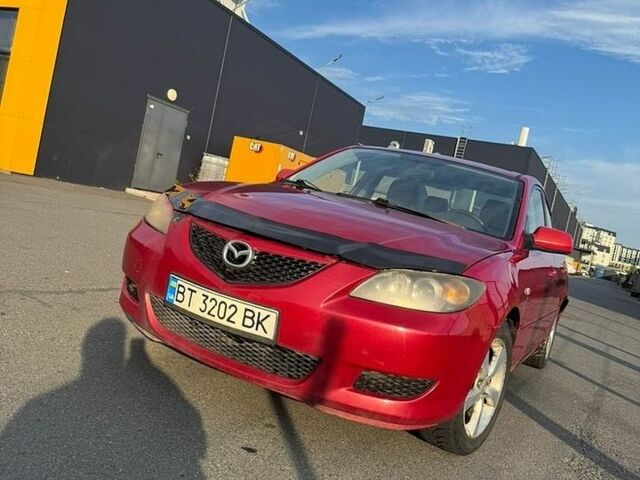 Красный Мазда 3, объемом двигателя 2 л и пробегом 245 тыс. км за 2400 $, фото 1 на Automoto.ua