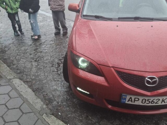 Красный Мазда 3, объемом двигателя 2 л и пробегом 210 тыс. км за 2700 $, фото 1 на Automoto.ua