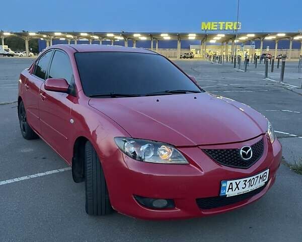 Красный Мазда 3, объемом двигателя 1.6 л и пробегом 331 тыс. км за 6000 $, фото 1 на Automoto.ua