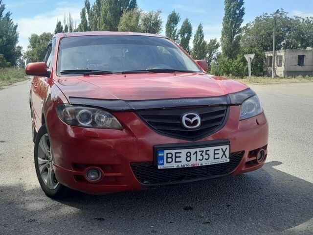 Красный Мазда 3, объемом двигателя 2 л и пробегом 243 тыс. км за 4450 $, фото 1 на Automoto.ua
