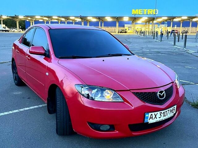 Красный Мазда 3, объемом двигателя 1.6 л и пробегом 331 тыс. км за 6000 $, фото 1 на Automoto.ua