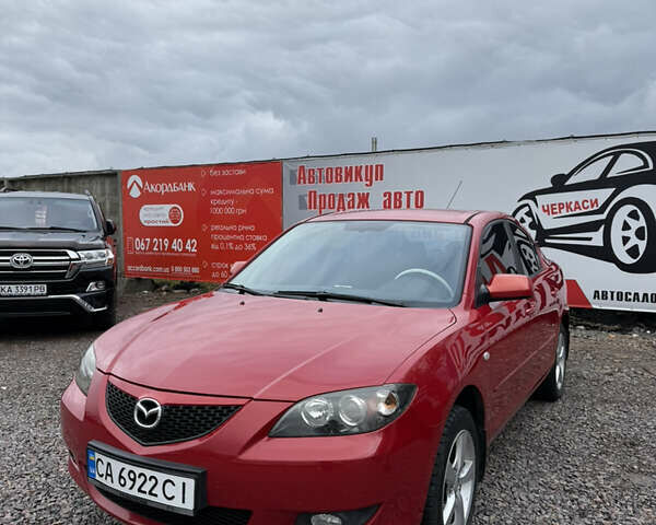 Красный Мазда 3, объемом двигателя 1.6 л и пробегом 203 тыс. км за 5300 $, фото 1 на Automoto.ua