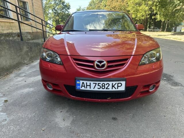 Красный Мазда 3, объемом двигателя 2 л и пробегом 203 тыс. км за 3702 $, фото 1 на Automoto.ua