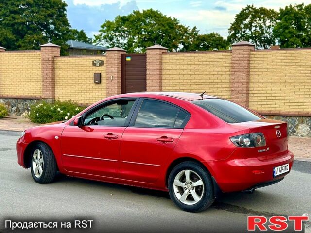Красный Мазда 3, объемом двигателя 1.6 л и пробегом 250 тыс. км за 4750 $, фото 1 на Automoto.ua