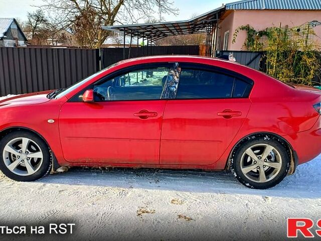 Красный Мазда 3, объемом двигателя 1.6 л и пробегом 171 тыс. км за 4500 $, фото 1 на Automoto.ua