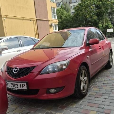 Красный Мазда 3, объемом двигателя 1.6 л и пробегом 220 тыс. км за 3310 $, фото 1 на Automoto.ua