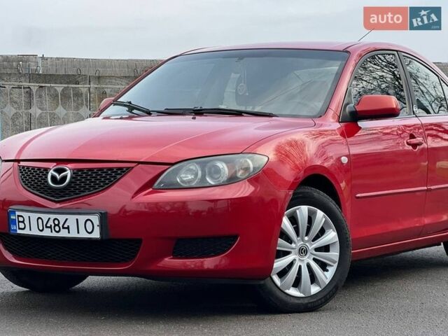 Красный Мазда 3, объемом двигателя 1.6 л и пробегом 266 тыс. км за 4800 $, фото 1 на Automoto.ua