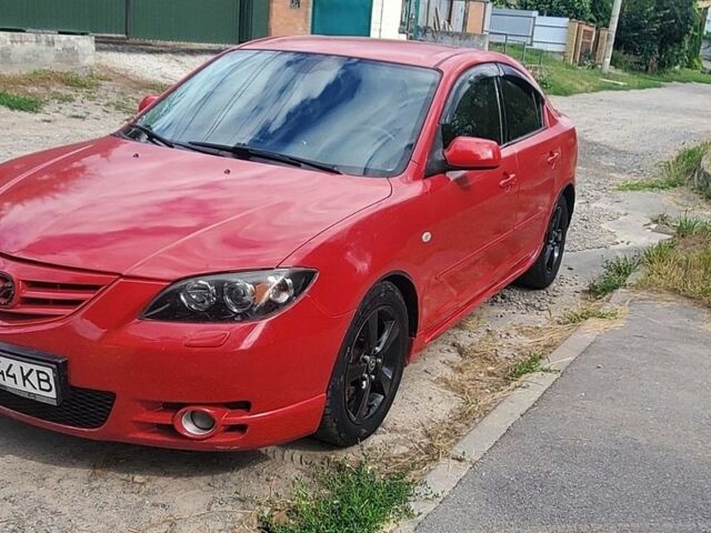 Червоний Мазда 3, об'ємом двигуна 2 л та пробігом 200 тис. км за 2950 $, фото 1 на Automoto.ua