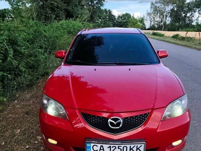 Червоний Мазда 3, об'ємом двигуна 1.6 л та пробігом 260 тис. км за 5700 $, фото 1 на Automoto.ua