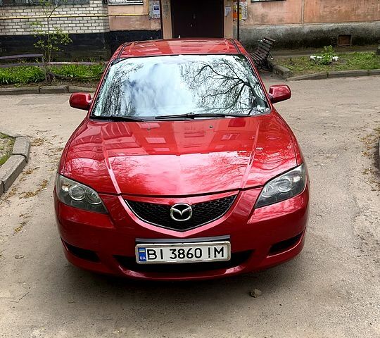 Красный Мазда 3, объемом двигателя 1.6 л и пробегом 218 тыс. км за 5600 $, фото 1 на Automoto.ua