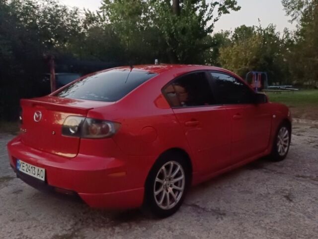 Красный Мазда 3, объемом двигателя 2 л и пробегом 211 тыс. км за 4350 $, фото 1 на Automoto.ua