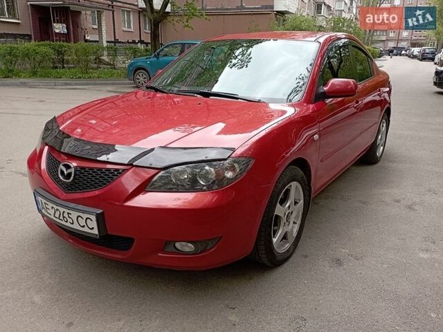 Красный Мазда 3, объемом двигателя 1.6 л и пробегом 244 тыс. км за 5250 $, фото 1 на Automoto.ua