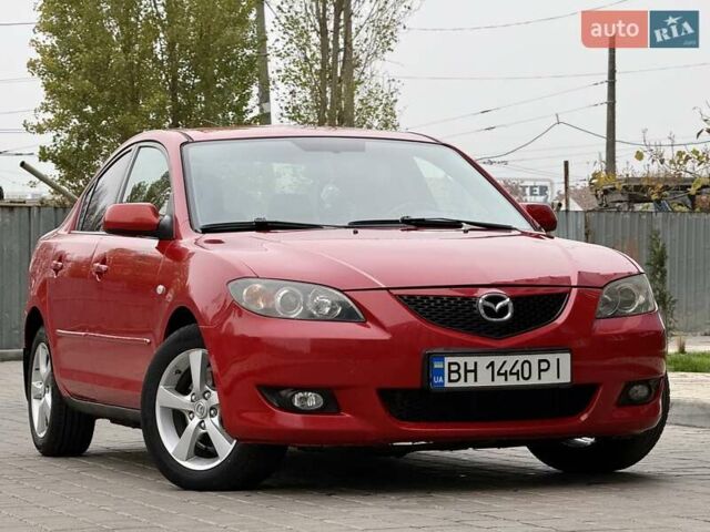 Красный Мазда 3, объемом двигателя 1.6 л и пробегом 207 тыс. км за 4400 $, фото 1 на Automoto.ua