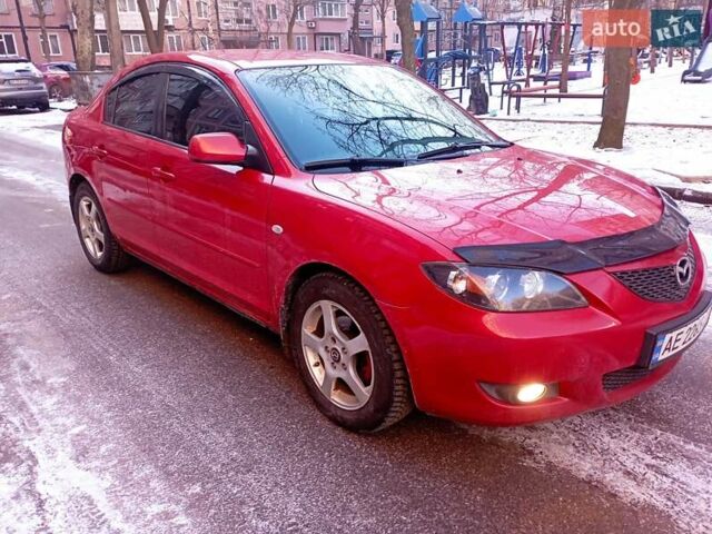 Красный Мазда 3, объемом двигателя 1.6 л и пробегом 243 тыс. км за 5999 $, фото 1 на Automoto.ua