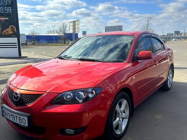 Красный Мазда 3, объемом двигателя 1.6 л и пробегом 190 тыс. км за 5999 $, фото 1 на Automoto.ua