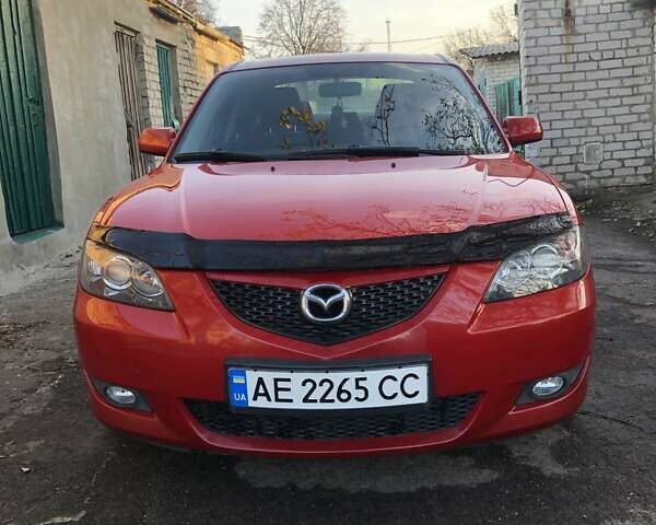 Красный Мазда 3, объемом двигателя 1.6 л и пробегом 241 тыс. км за 5000 $, фото 1 на Automoto.ua