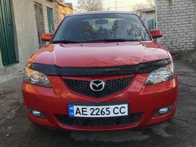 Красный Мазда 3, объемом двигателя 1.6 л и пробегом 242 тыс. км за 5852 $, фото 1 на Automoto.ua