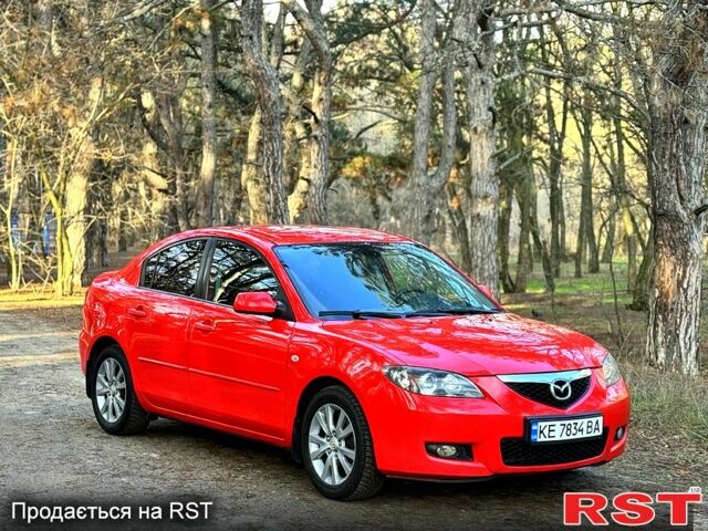 Красный Мазда 3, объемом двигателя 1.6 л и пробегом 230 тыс. км за 5500 $, фото 1 на Automoto.ua