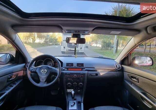 Красный Мазда 3, объемом двигателя 1.6 л и пробегом 100 тыс. км за 5850 $, фото 1 на Automoto.ua