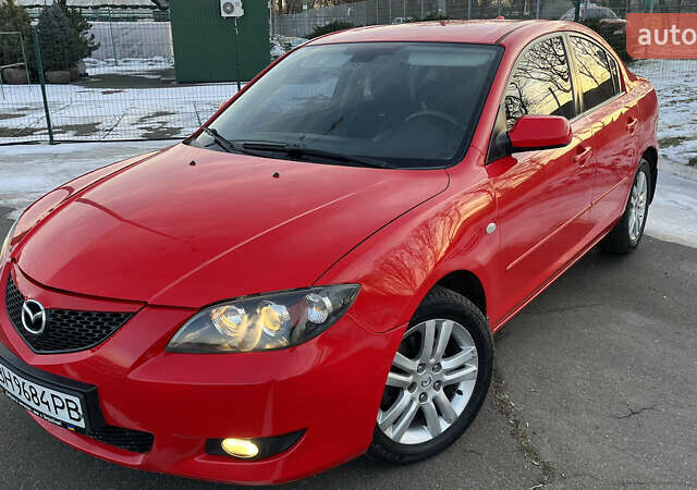 Красный Мазда 3, объемом двигателя 1.6 л и пробегом 205 тыс. км за 5800 $, фото 1 на Automoto.ua
