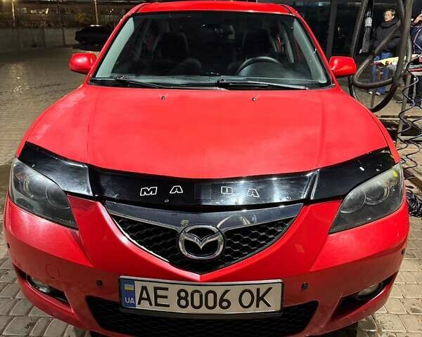 Красный Мазда 3, объемом двигателя 1.6 л и пробегом 234 тыс. км за 3999 $, фото 1 на Automoto.ua