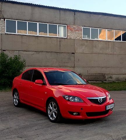 Красный Мазда 3, объемом двигателя 2 л и пробегом 200 тыс. км за 4450 $, фото 1 на Automoto.ua