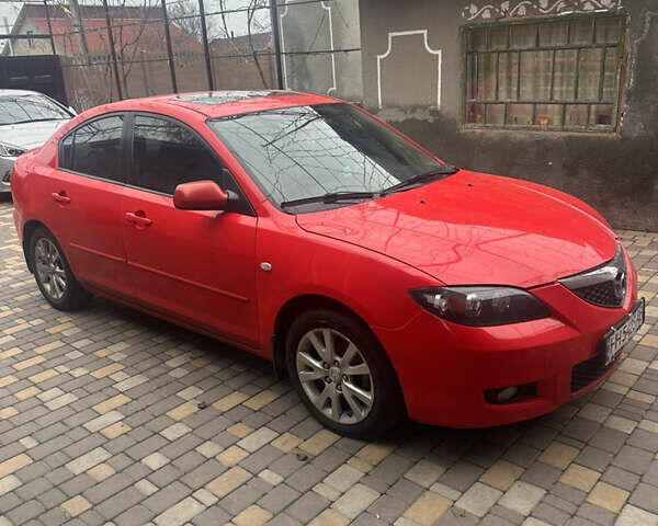 Красный Мазда 3, объемом двигателя 1.6 л и пробегом 310 тыс. км за 4500 $, фото 1 на Automoto.ua