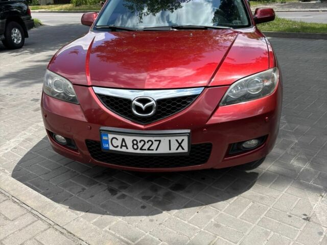 Красный Мазда 3, объемом двигателя 2 л и пробегом 200 тыс. км за 6500 $, фото 1 на Automoto.ua