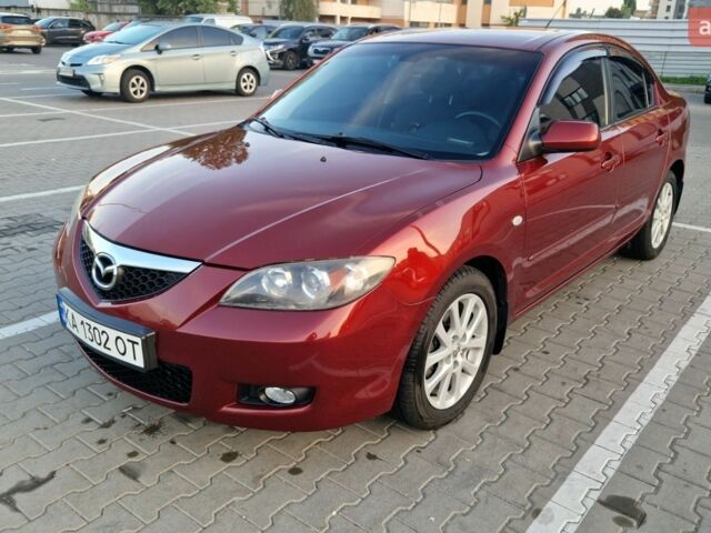 Красный Мазда 3, объемом двигателя 1.6 л и пробегом 235 тыс. км за 5850 $, фото 1 на Automoto.ua