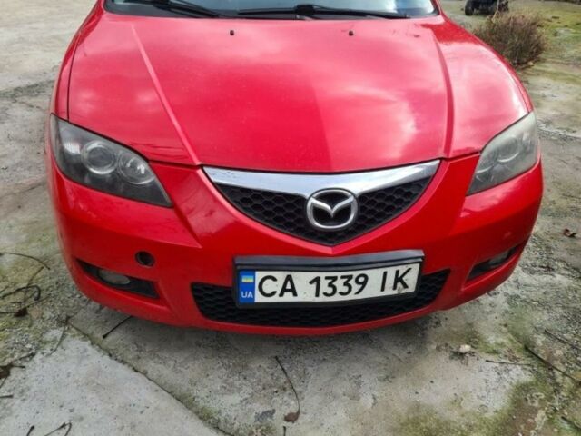 Красный Мазда 3, объемом двигателя 1.6 л и пробегом 225 тыс. км за 5600 $, фото 1 на Automoto.ua