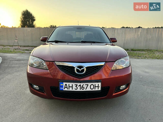 Красный Мазда 3, объемом двигателя 1.6 л и пробегом 123 тыс. км за 5200 $, фото 1 на Automoto.ua