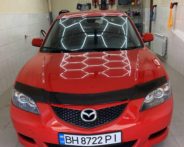 Красный Мазда 3, объемом двигателя 1.6 л и пробегом 309 тыс. км за 5200 $, фото 1 на Automoto.ua